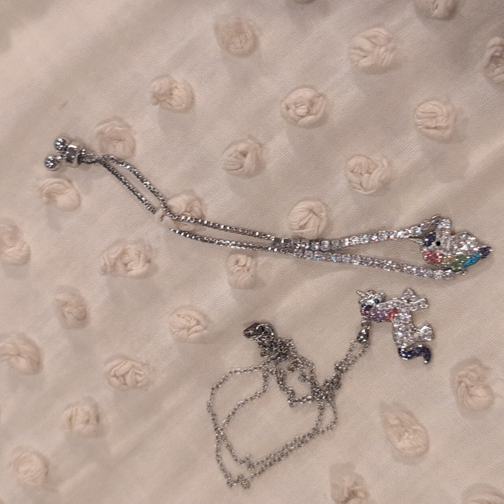Silver Unicorn Pendant Necklace And Bracelet